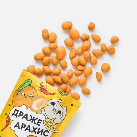 Изображение товара Арахис Самокат, с соком манго, перцем чили, в белой шоколадной глазури, 65 г