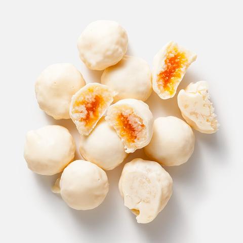 Изображение товара Конфеты Самокат в белой шоколадной глазури с кокосом и манго 140 г