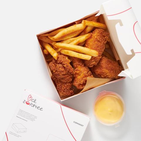 Изображение товара Куриные крылья острые с картофелем фри и сырным соусом 385 г